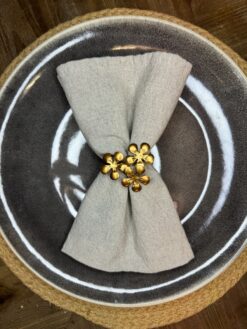 Servettringar -mässing-blomma